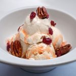 White Chocolate Ice Cream Sundae with Cran-Raspberry Caramel Sauce » US Cranberries